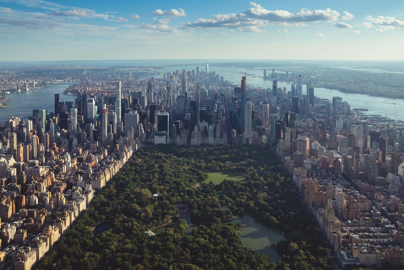 Aerial view of Manhattan looking south over Central Park toward Midtown and the harbor.